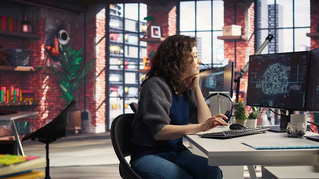 Teleworking developer using computer for artificial intelligence brain